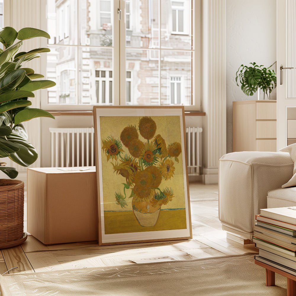 Living room with a framed artwork of sunflowers on a wooden floor.